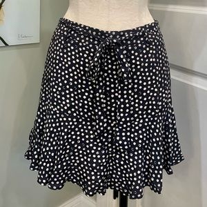 Polka Dot black and white swing skirt with attached tie belt. Size Small